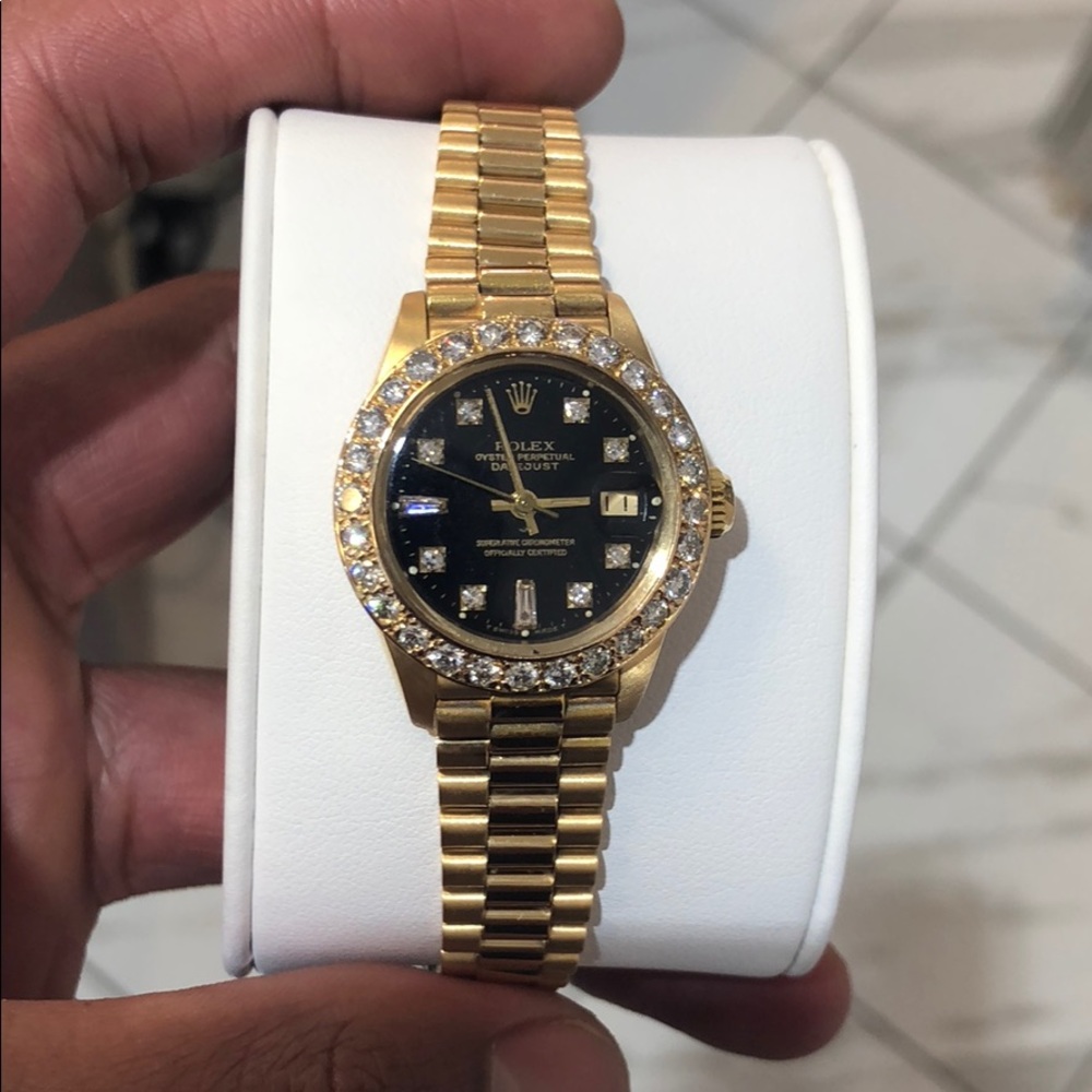 Rolex lady’s 18k gold diamond presidential